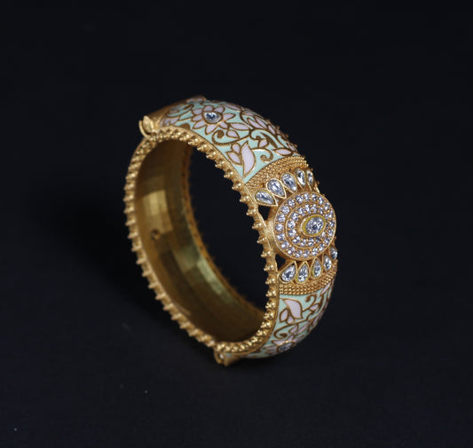 GOLD PLATED STERLING SILVER BANGLE WITH ENAMEL IN JADAU COLLECTIONS.