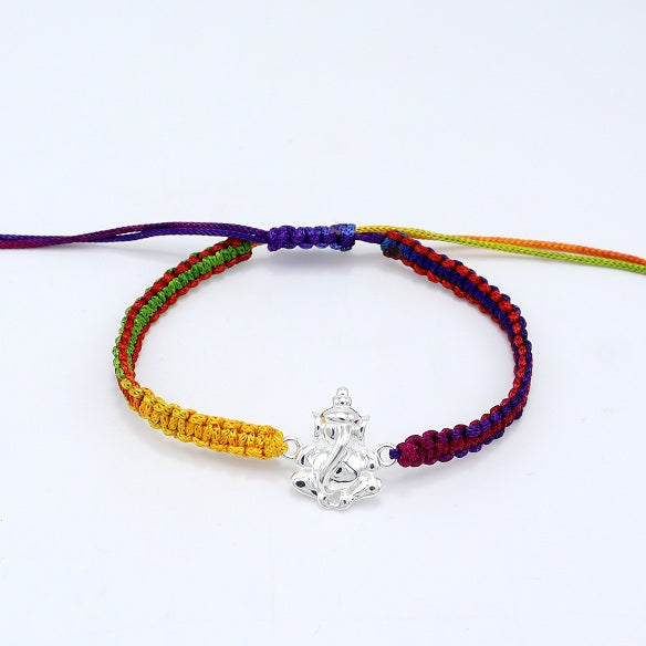 RAKHI IN 92.5 STERLING SILVER WITH  THREAD.