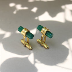 CUFFLINKS:- 92.5 STERLING SILVER, GOLD PLATED WITH GREEN ONYX.