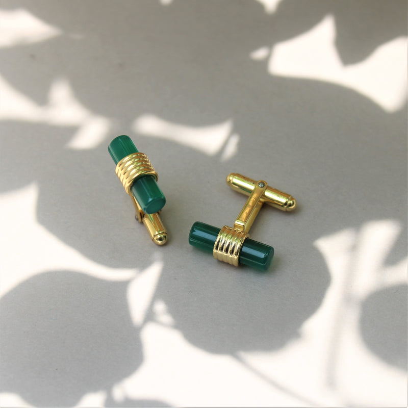 CUFFLINKS:- 92.5 STERLING SILVER, GOLD PLATED WITH GREEN ONYX.