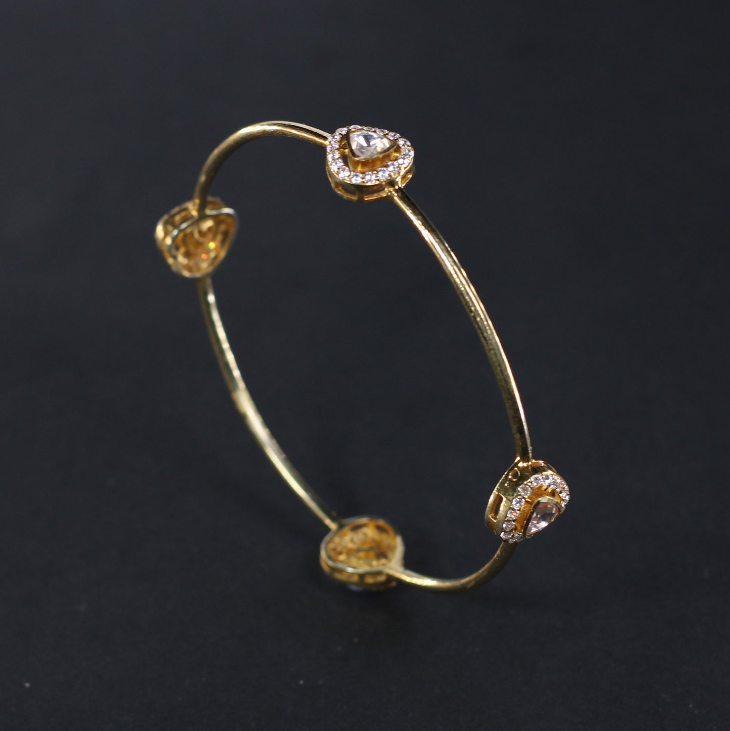 EACH BANGLE IN 92.5 STERLING SILVER WITH 18KT GOLD PLATED , MOSONITE POLKI AND ZIRCONIA
