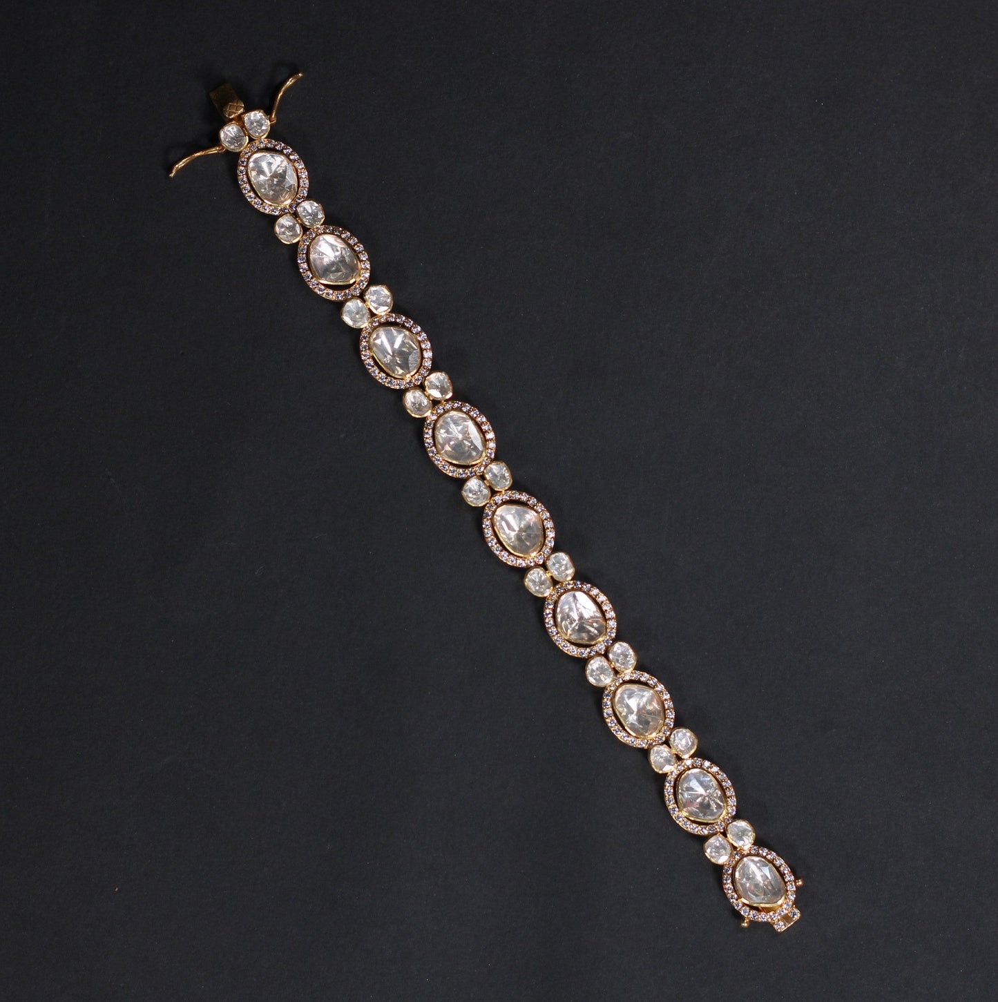 GOLD PLATED STERLING SILVER BRACELET IN JADAU COLLECTIONS.